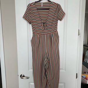 Striped Jumpsuit with pockets and pocket v-neck